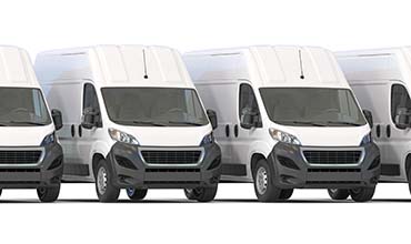 Delivery vans in a row isolated on white.  Express delivery and shipment service concept. 3d illustration